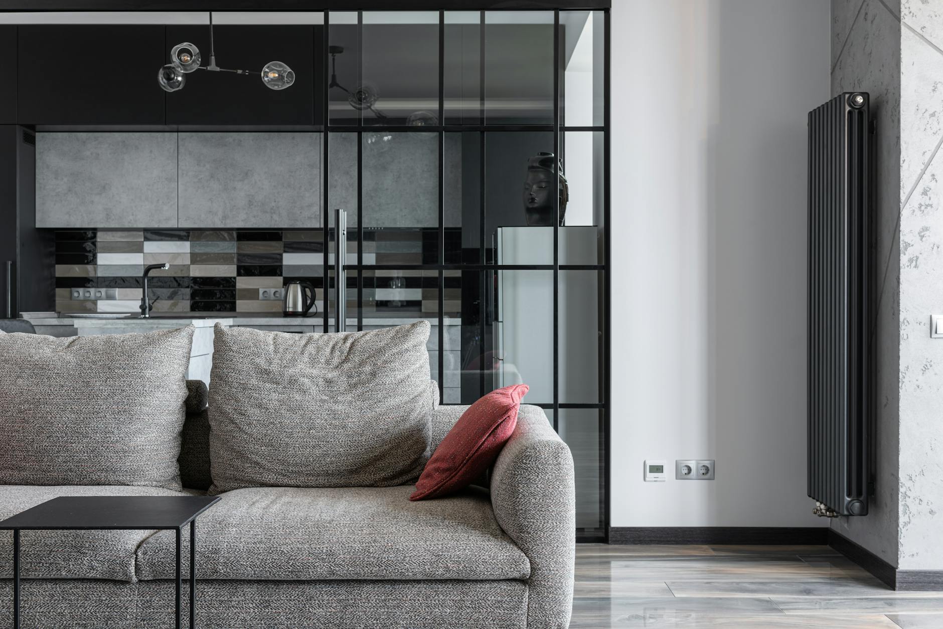 Modern serviced apartment interior with kitchen and living space in Manchester