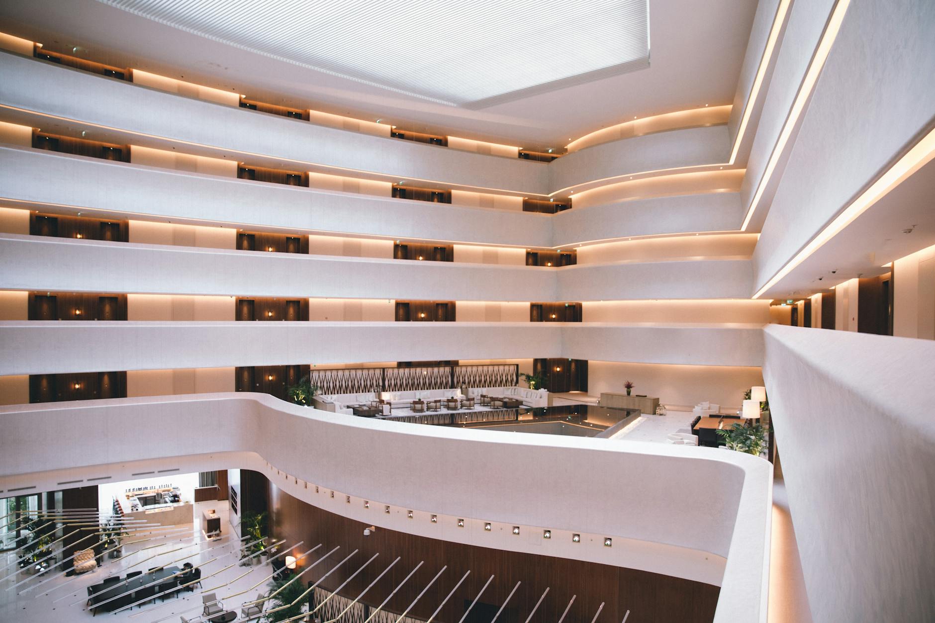 Sleek modern hotel lobby with contemporary design and seating area
