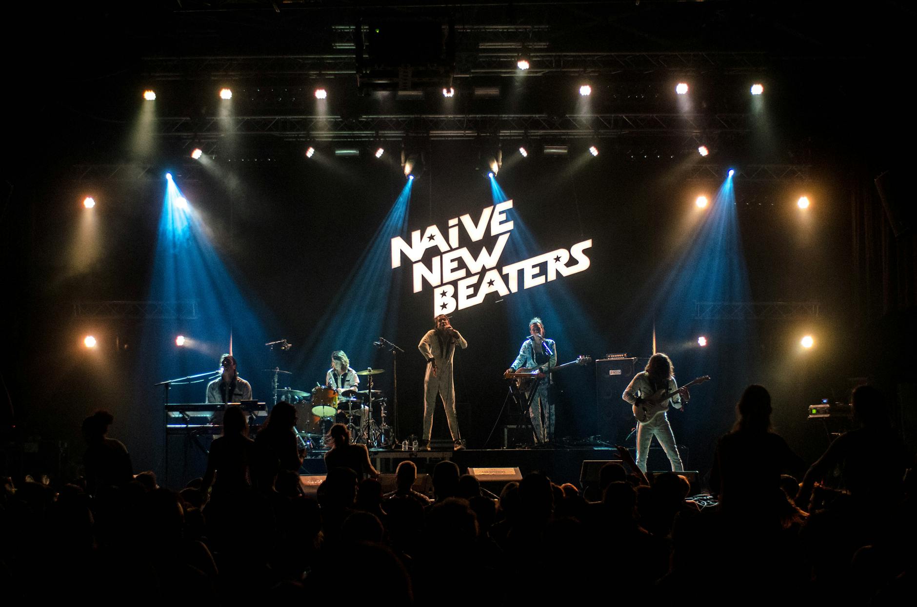 Manchester nightlife live music concert venue with band performing on stage