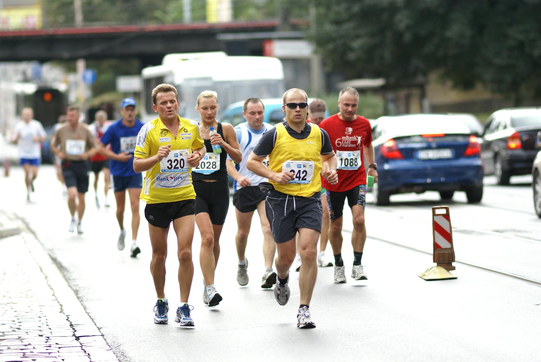 Manchester Events & Festivals 2026: What's On Guide 3 Manchester Marathon runners — one of the UK's biggest running Manchester events