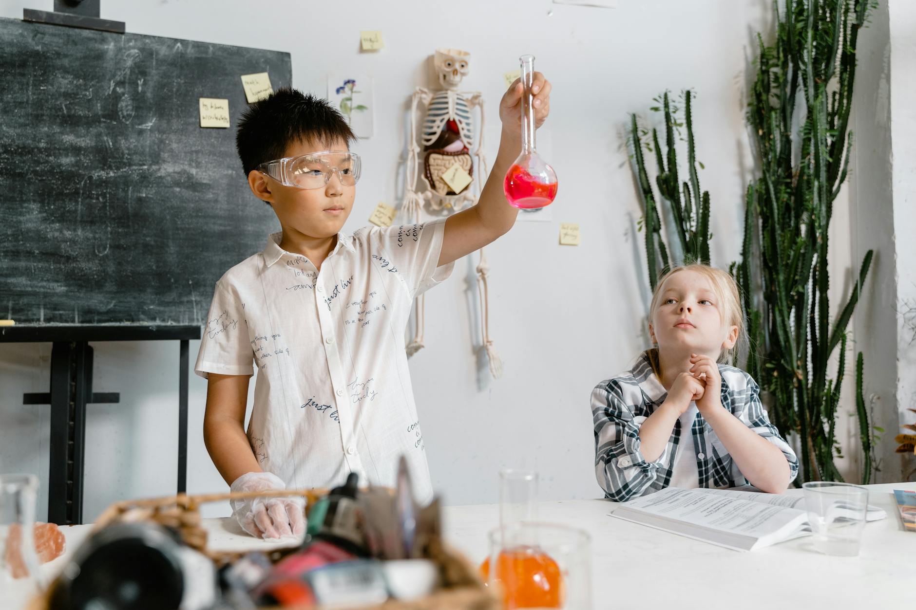 Manchester for Families: The Complete Kids & Family Guide 5 Children engaged in hands-on science experiments at a museum