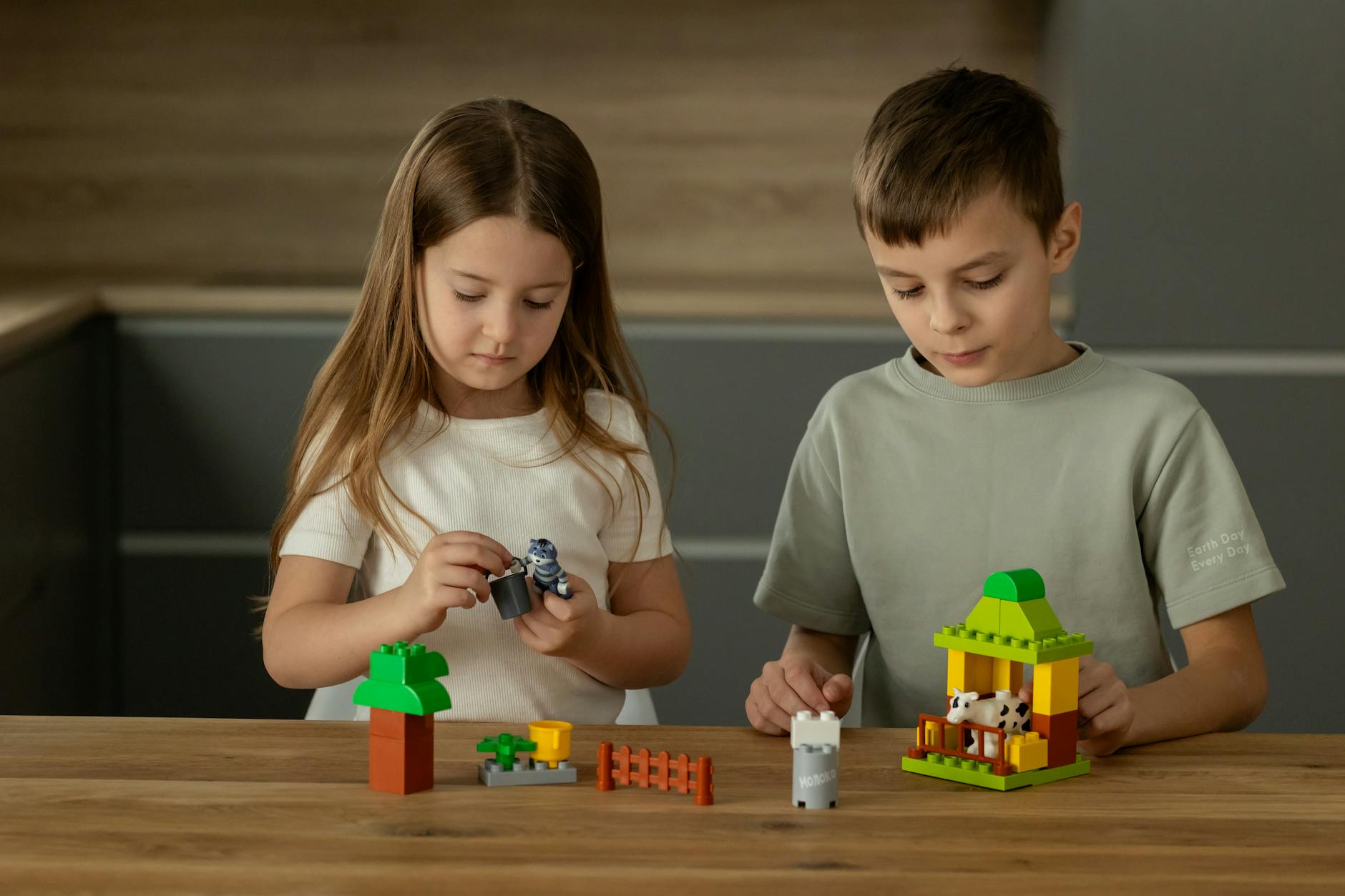Manchester for Families: The Complete Kids & Family Guide 3 Children building with LEGO bricks at a discovery centre