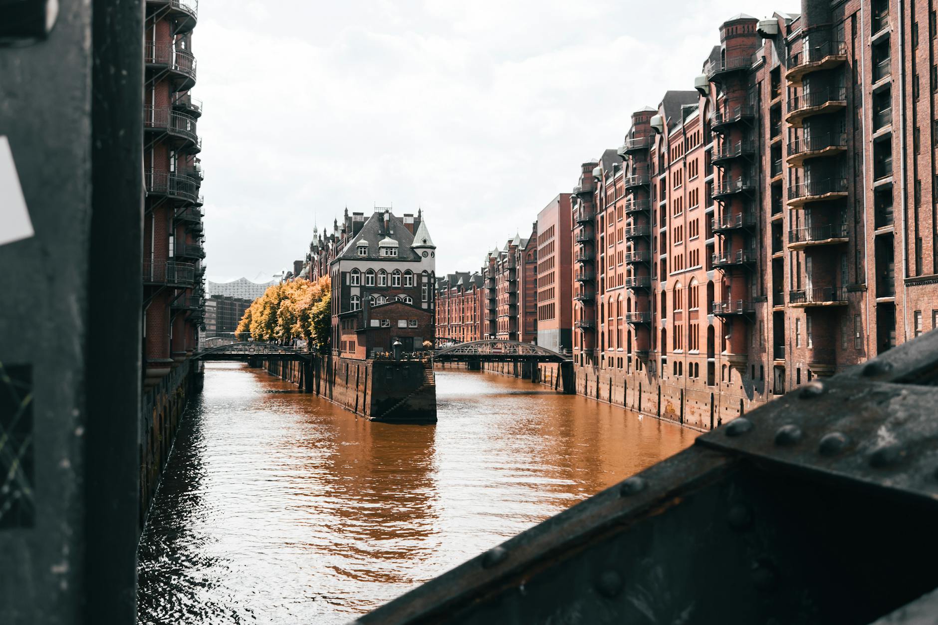 Historic canal warehouse district with cobblestone paths