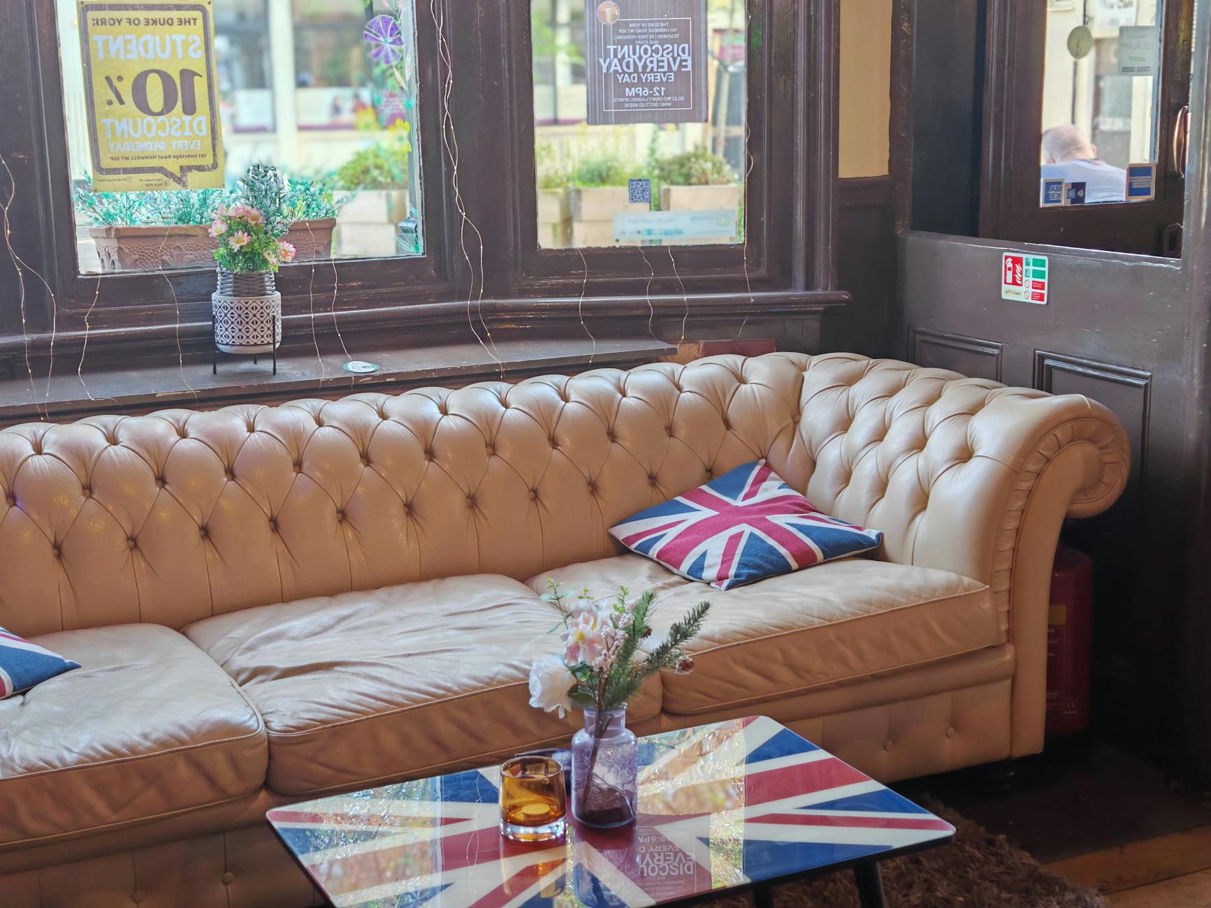 Didsbury & South Manchester Guide: Restaurants, Pubs & Things to Do (2026) 4 Traditional British pub interior with wooden bar and pints of beer Didsbury