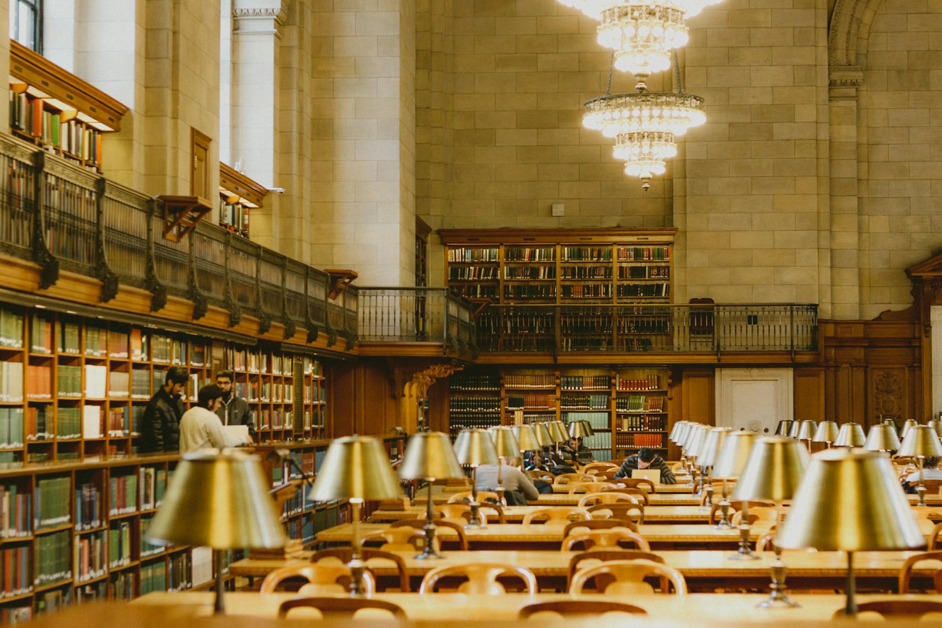John Rylands Library Manchester: Complete Visitor Guide 2026 5 Old library reading room oak desks lamps Victorian Gothic