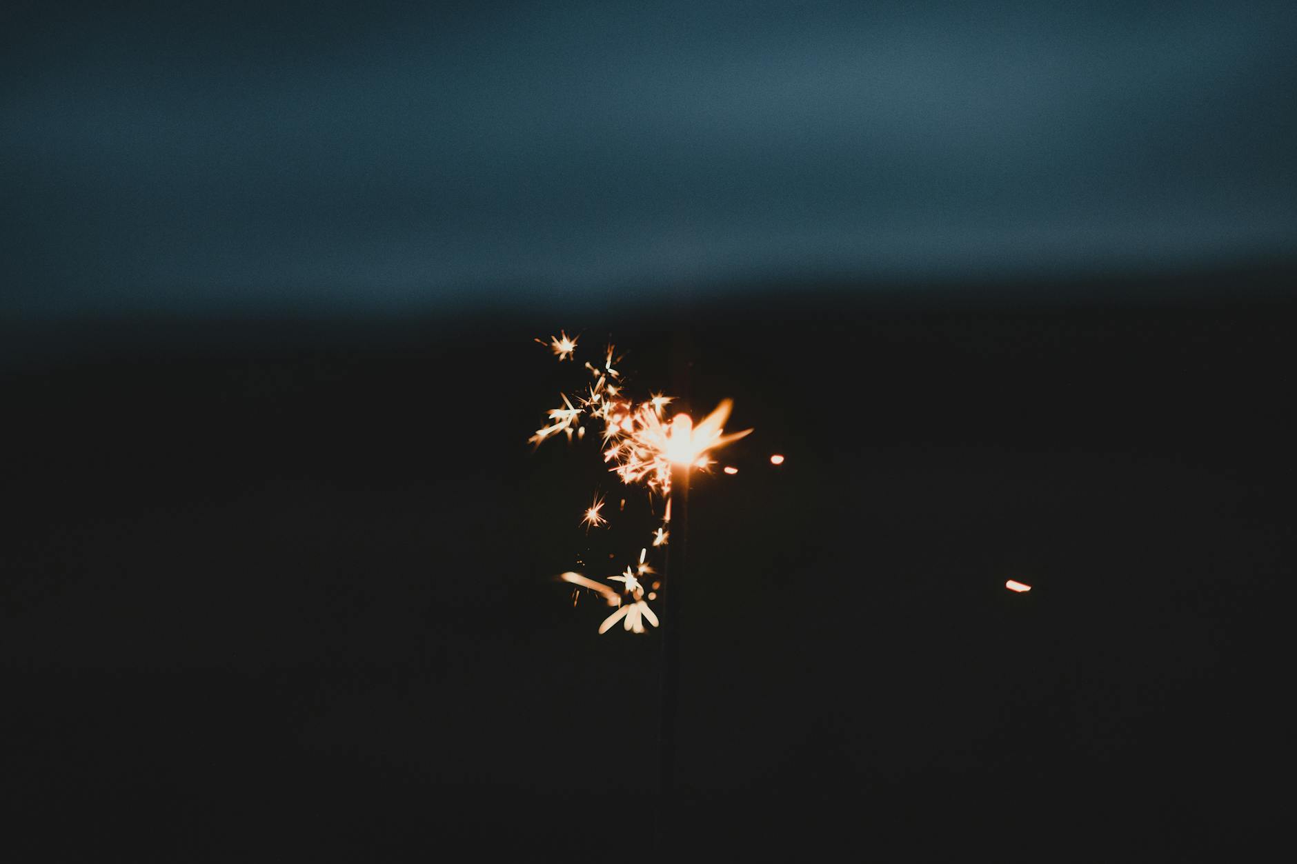 Manchester Bonfire Night 2026: Fireworks & Events Guide 4 children sparklers Bonfire Night family fireworks autumn evening