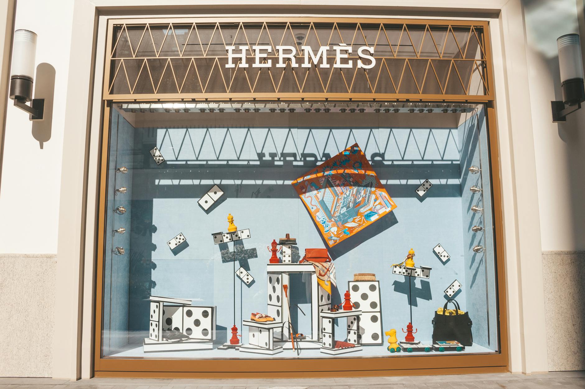Designer & Luxury Shopping in Manchester: The Complete 2026 Guide 4 Designer luxury fashion shop window display brand Manchester