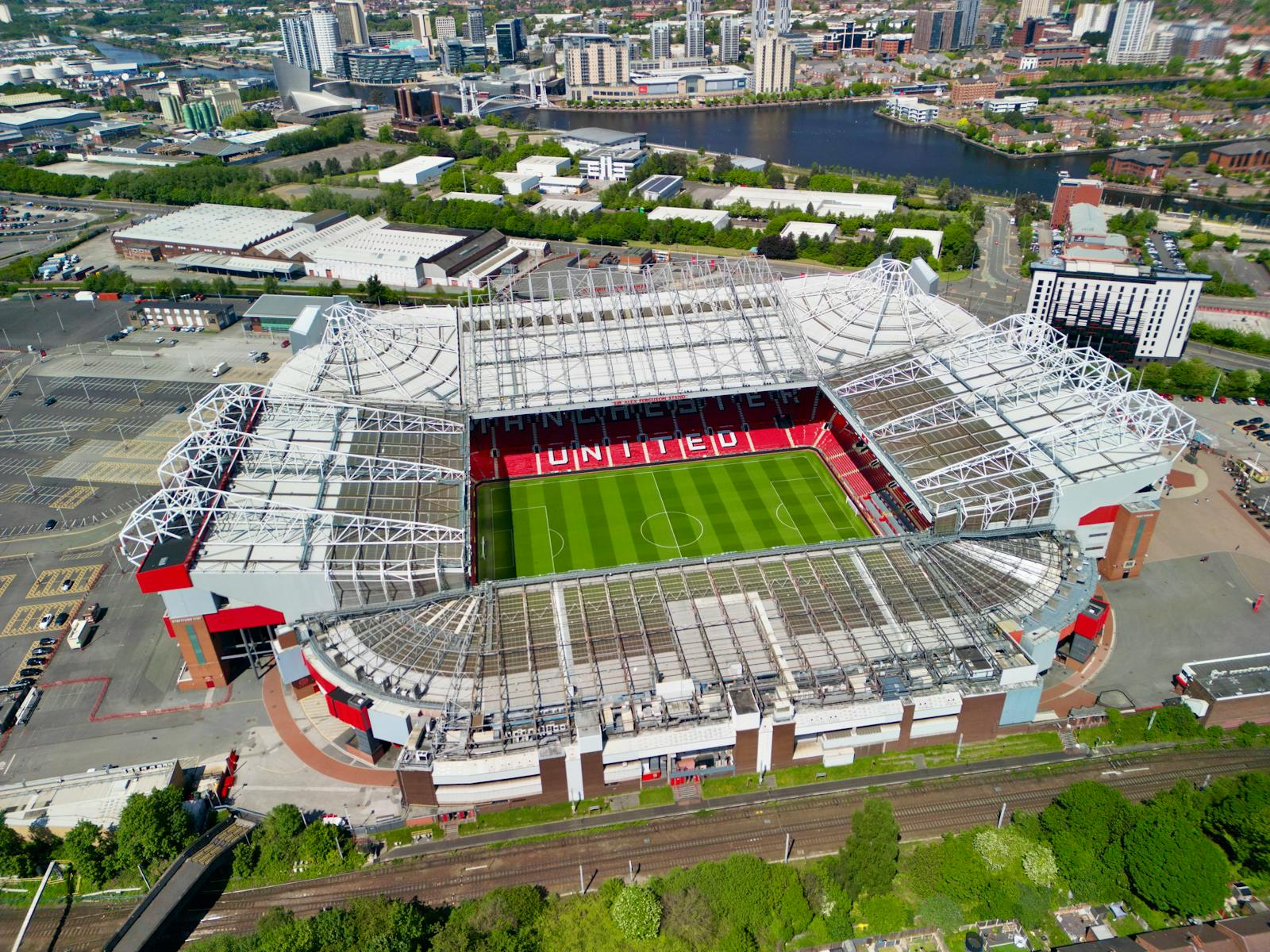 Manchester Metrolink Tram Guide for Visitors (2026) 6 Manchester Metrolink trams serving Old Trafford on a match day