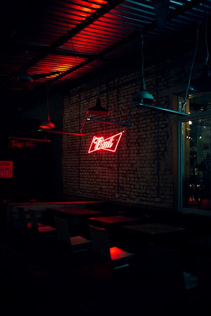 Best Cocktail Bars in Manchester: Speakeasy & Rooftop Guide (2026) 7 Manchester neon nightlife bar