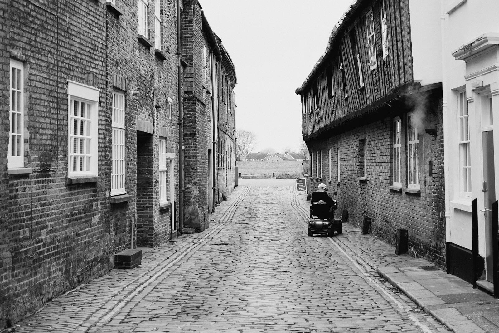 Is Manchester Walkable? A Walking Guide to the City (2026) 6 Cobbled street in Manchester for walking accessibility