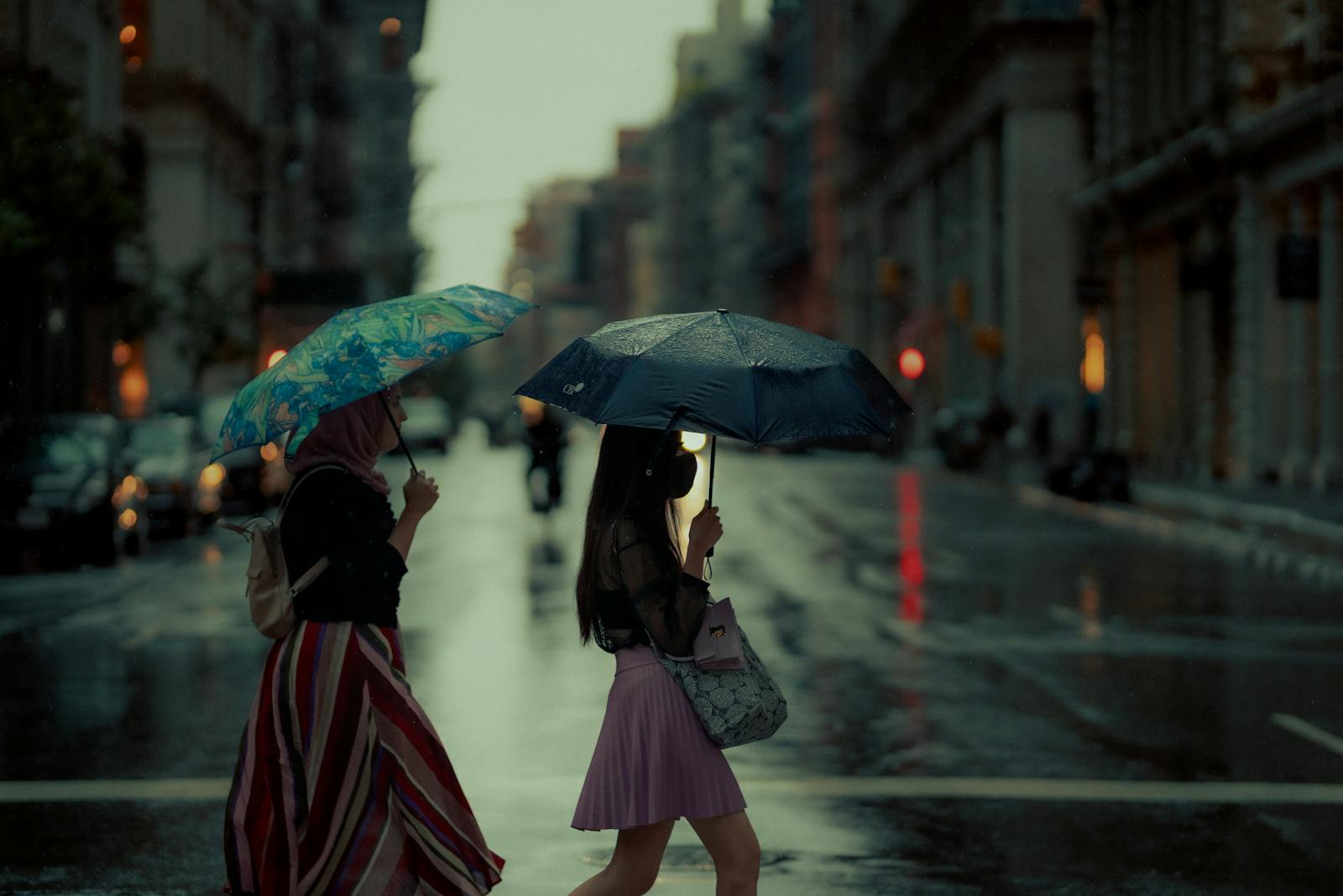 Is Manchester Walkable? A Walking Guide to the City (2026) 5 Pedestrians walking on a rainy day in Manchester