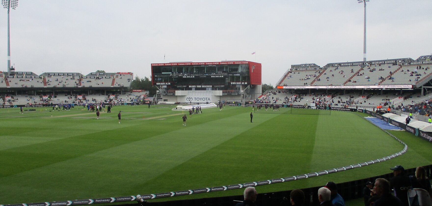 Spectators and players at Emirates Old Trafford during a Test match in July 2025